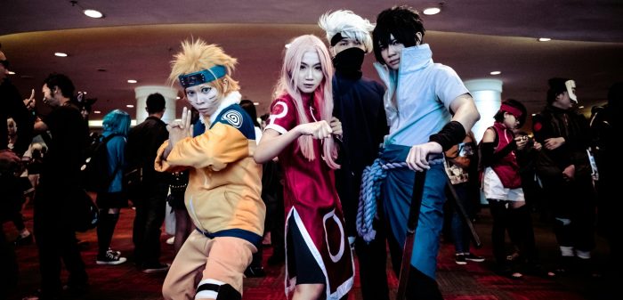 Personas haciendo cosplay de Naruto